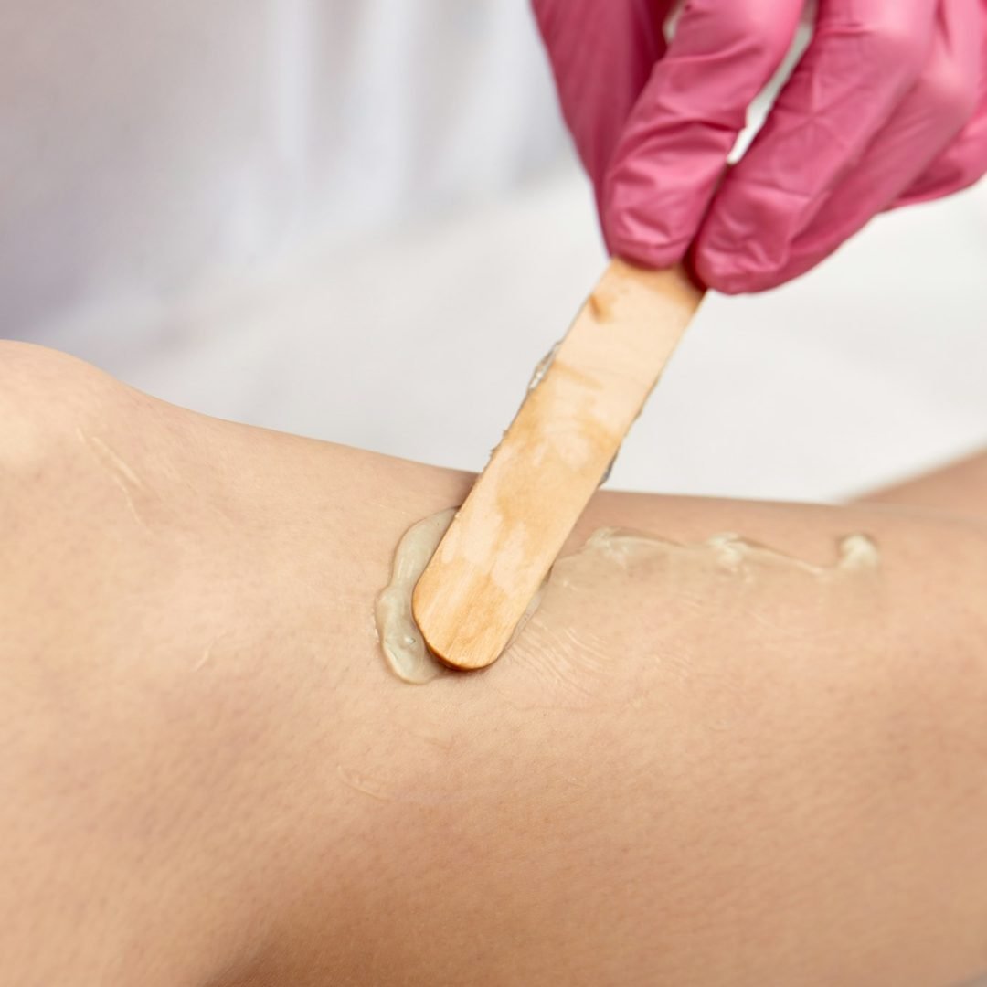 Laser depilation or photoepilator process on a woman leg.